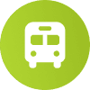 Ein rundes grünes Symbol mit einem weißen Bus in der Mitte, dargestellt in einfacher grafischer Form